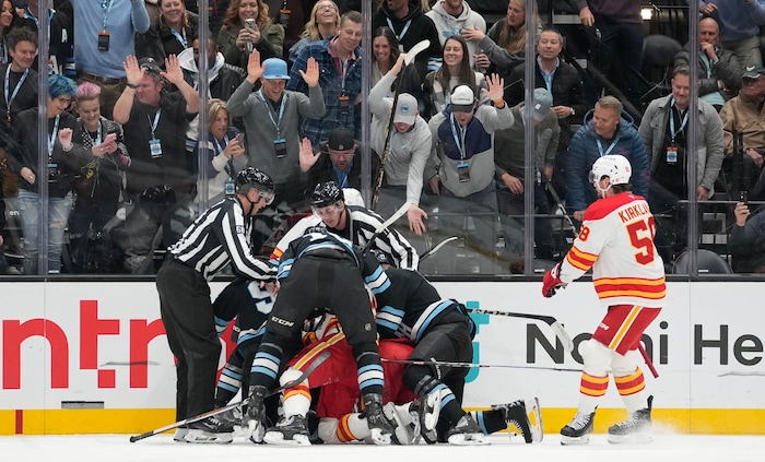 (Francisco Kjolseth  | The Salt Lake Tribune) The crowd gets into a fight between Utah Hockey Club and the Calgary Flames during an NHL hockey game at the Delta Center in Salt Lake City on Wednesday, Oct. 30, 2024.