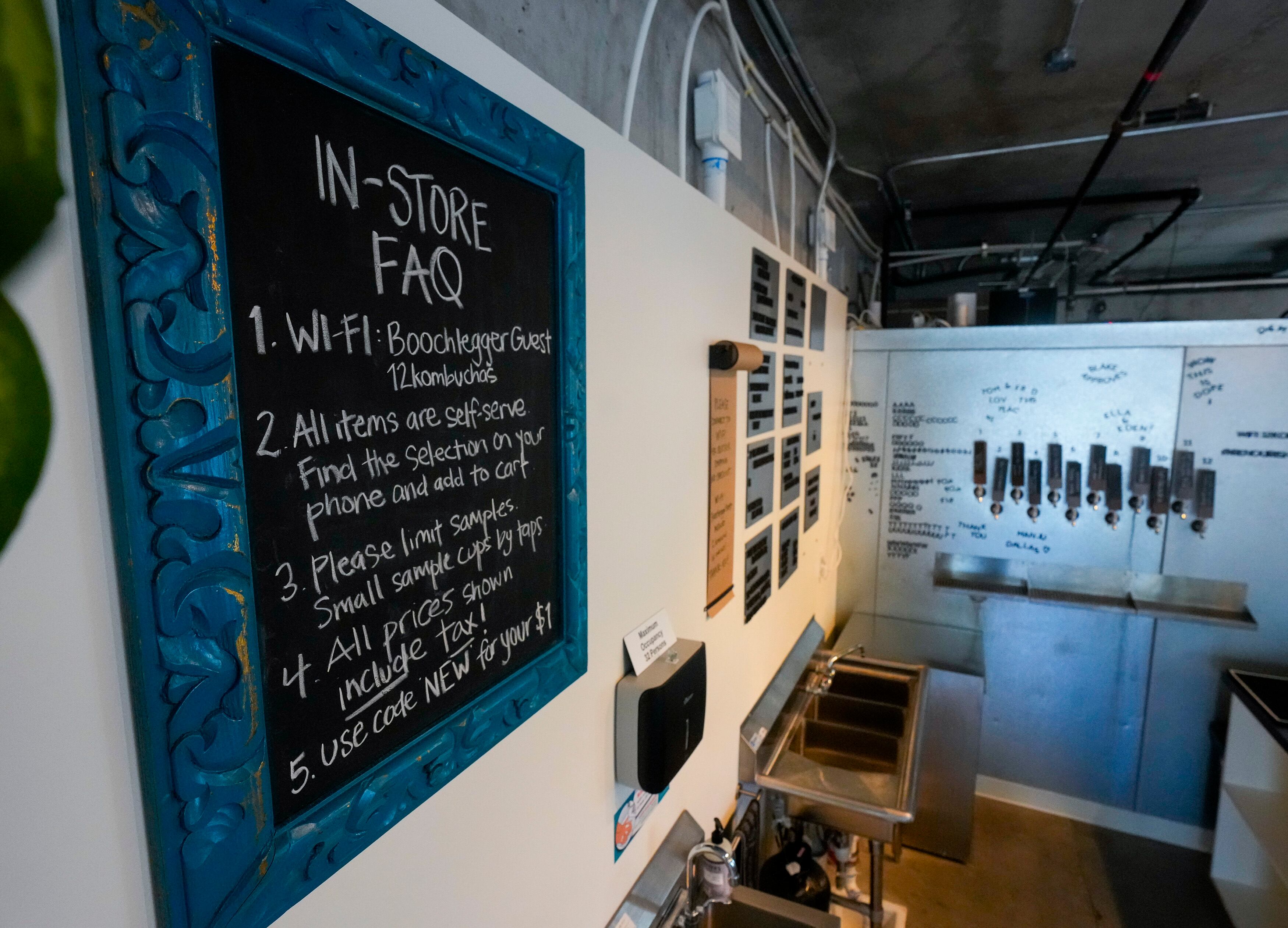 (Bethany Baker | The Salt Lake Tribune) A sign hangs on the wall to inform customers at Renourish Taproom, a kombucha taproom that recently adopted a "staffless" business model, in Salt Lake City on Wednesday, June 12, 2024.