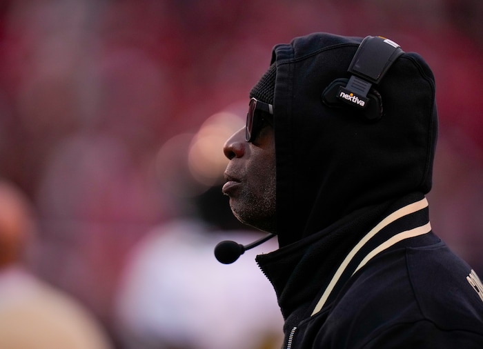 (Bethany Baker  |  The Salt Lake Tribune) Colorado Buffaloes head coach Deion Sanders watches the game against the Utah Utes at Rice-Eccles Stadium in Salt Lake City on Saturday, Nov. 25, 2023.