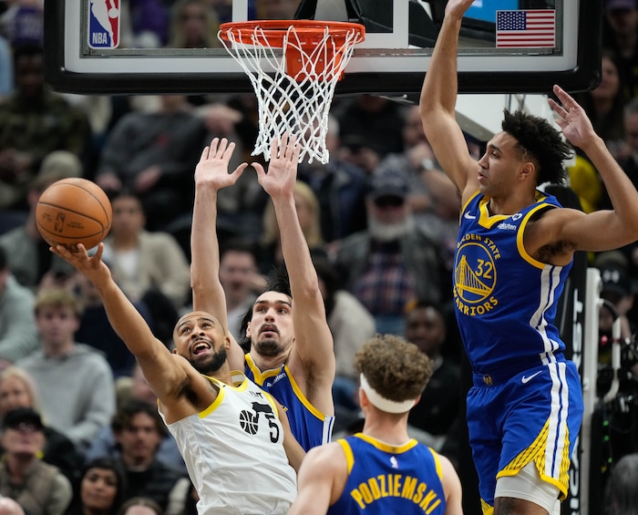 (Francisco Kjolseth  |  The Salt Lake Tribune) Utah Jazz guard Talen Horton-Tucker (5) reaches out for a rebound while surrounded by the Warriors defense during an NBA basketball game Thursday, Feb. 15, 2024, in Salt Lake City.