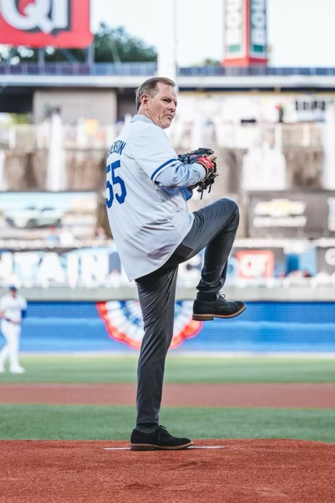 (The Church of Jesus Christ of Latter-day Saints) Apostle Gary E. Stevenson of The Church of Jesus Christ of Latter-day Saints throws the ceremonial first pitch at a Kansas City Royals baseball game on Tuesday, Aug. 6, 2024, which was also his 69th birthday.