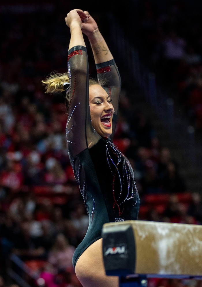 (Rick Egan | The Salt Lake Tribune)  Makenna Smith performs on the beam, in gymnastics action between Utah Red Rocks and Oregon State, at the Jon M. Huntsman Center, on Friday, Feb. 2, 2024.
