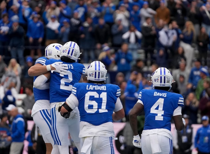 (Bethany Baker  |  The Salt Lake Tribune) Brigham Young Cougars celebrate a play against the Oklahoma Sooners at LaVell Edwards Stadium in Provo on Saturday, Nov. 18, 2023.