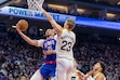 (Sara Nevis | AP) Sacramento Kings center Alex Len (25) makes a layup around Utah Jazz forward Lauri Markkanen (23) during the first half of an NBA basketball game Saturday, Nov. 16, 2024, in Sacramento, Calif.