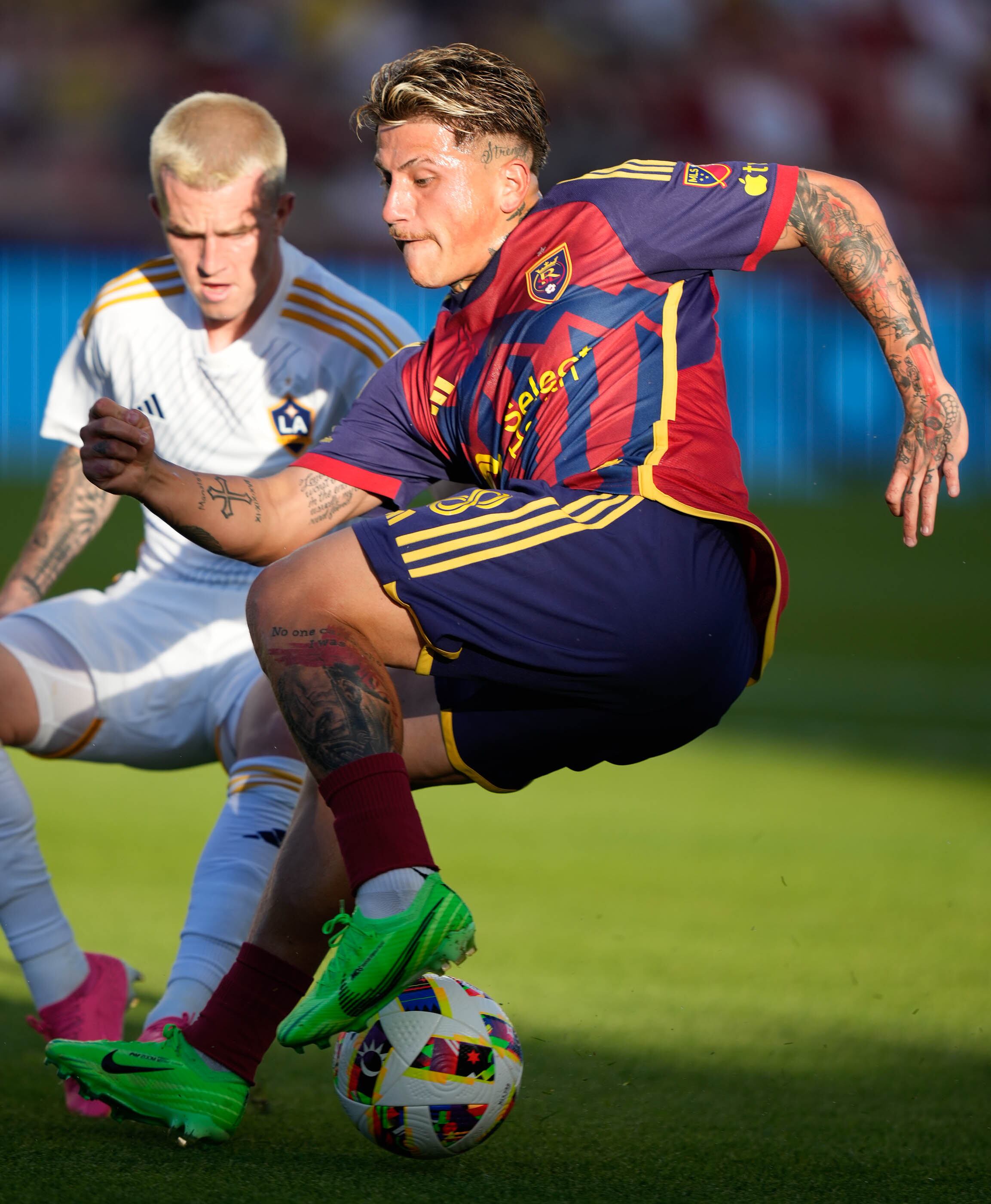 (Francisco Kjolseth | The Salt Lake Tribune) Real Salt Lake midfielder Diego Luna (8) is pressured by Los Angeles Galaxy midfielder Tucker Lepley (21) during an MLS soccer match against LA Galaxy on Saturday, June 22, 2024, in Sandy Utah.