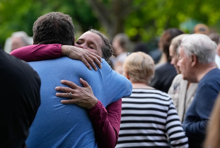 (Francisco Kjolseth | The Salt Lake Tribune) Salt Lake City Mayor Erin Mendenhall embraces Dave Owen, father of Sam Owen, at Laird Park in Salt Lake City on Wednesday, May 22, 2024. Police say Sam fatally shot his son, Adlai, before killing himself in an apparent murder-suicide on Saturday, May 18, 2024.