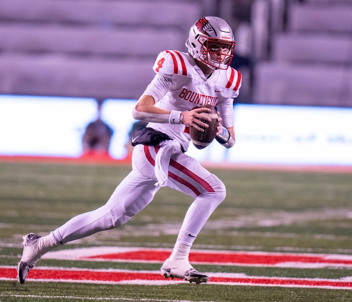 (Rick Egan | The Salt Lake Tribune)   Bountiful QB runs for the Redhawks, in 5A State playoff action between the Timpview Thunderbirds and the Bountiful Redhawks, at Rice-Eccles Stadium, on Friday, Nov. 17, 2023.
