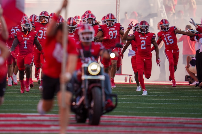 (Trent Nelson  |  The Salt Lake Tribune) The Utah Utes take the field to face the Florida Gators, NCAA football in Salt Lake City on Thursday, Aug. 31, 2023.