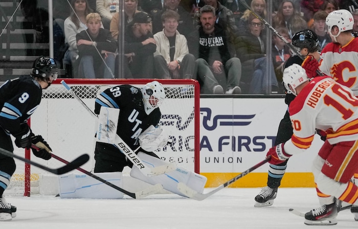 (Francisco Kjolseth  | The Salt Lake Tribune) Utah Hockey Club goaltender Connor Ingram (39) blocks a shot on goal by the Calgary Flames during an NHL hockey game at the Delta Center in Salt Lake City on Wednesday, Oct. 30, 2024.