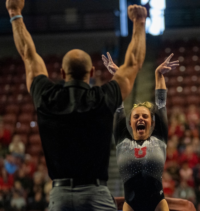 (Rick Egan | The Salt Lake Tribune)  Ella Zirbes reacts she lands her vault, for Utah, as the Red Rocks vs. LSU, Oklahoma and UCLA at the Maverik Center, on Saturday, Jan. 13, 2024.
