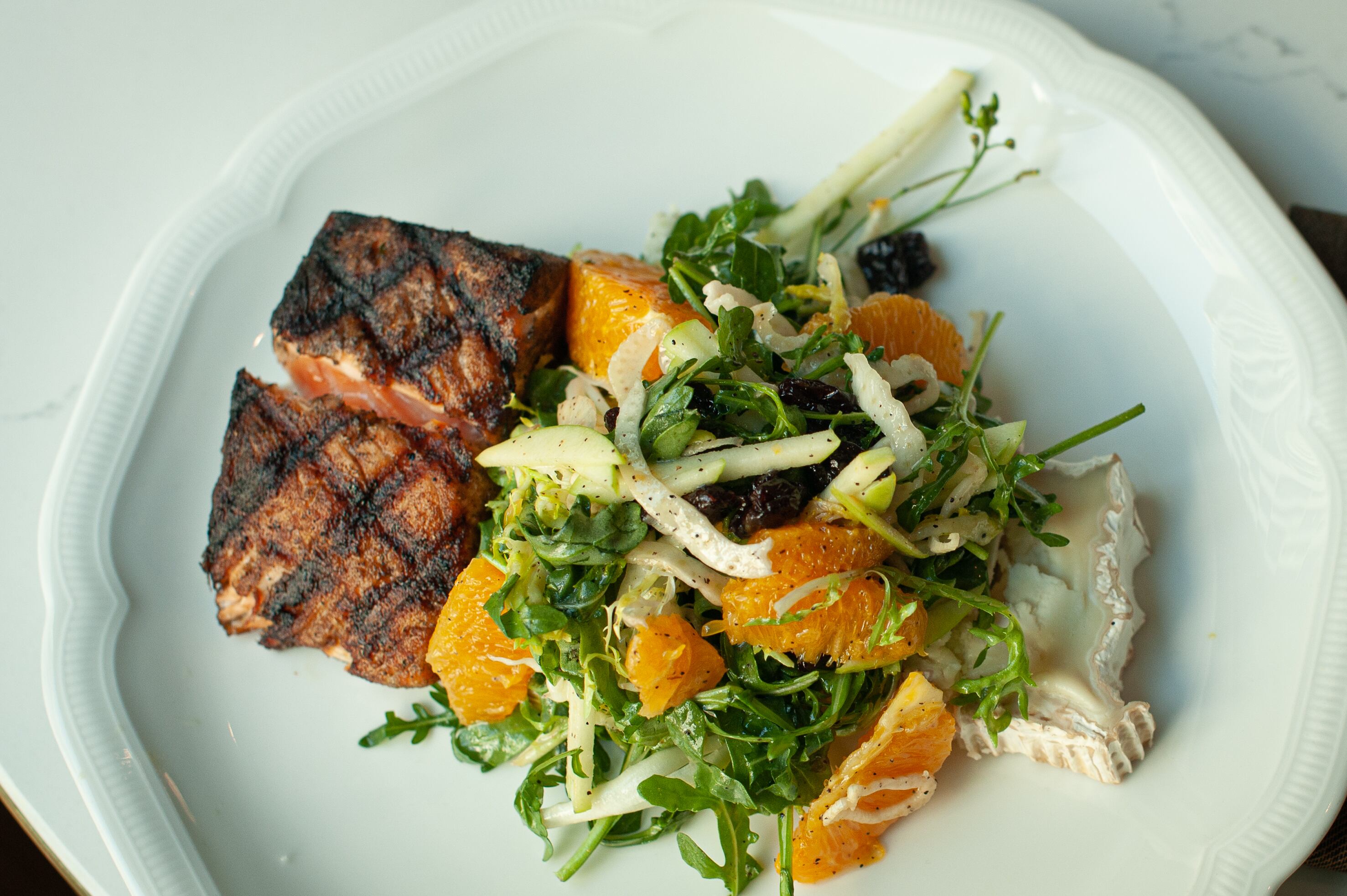 (Adelaide) The new fire-kissed salmon arugula and fennel salad from Adelaide restaurant is pictured.