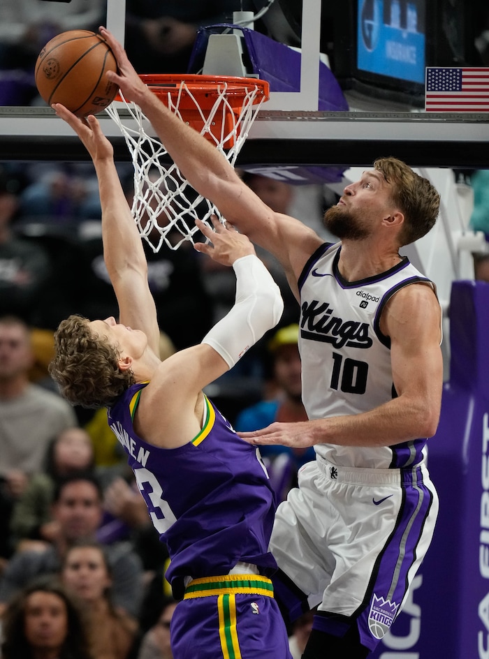 (Francisco Kjolseth  |  The Salt Lake Tribune) Sacramento Kings forward Domantas Sabonis (10) blocks Utah Jazz forward Lauri Markkanen (23) and draws a foul as the Utah Jazz host the Sacramento Kings, during NBA basketball in Salt Lake City on Wednesday, Oct. 25, 2023.