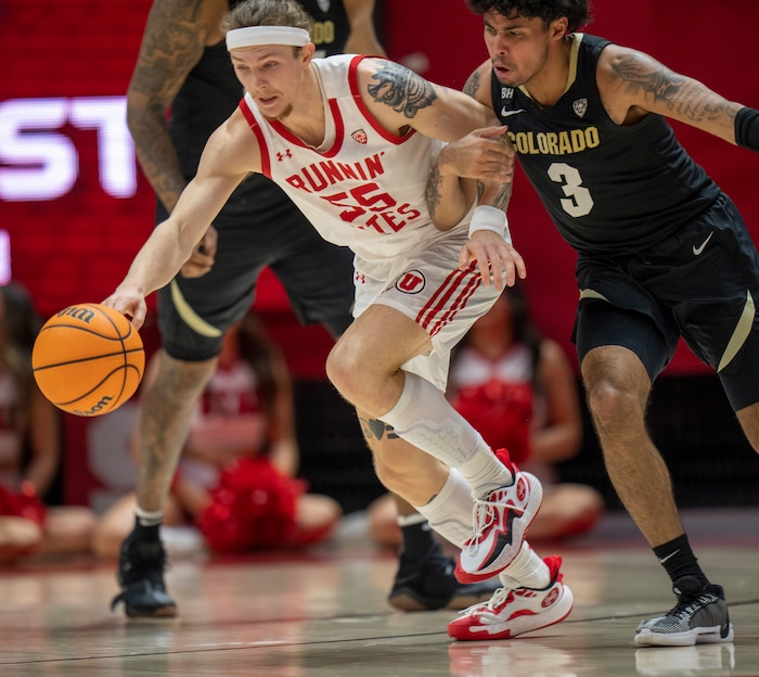 (Rick Egan | The Salt Lake Tribune) Utah Utes guard Gabe Madsen (55) steals the ball from Colorado Buffaloes guard Julian Hammond III (3), in PAC-12 basketball action between the Utah Utes and the Colorado Buffaloes a the Jon M. Huntsman Center, on Saturday, Feb. 3, 2024.
