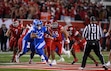 (Bethany Baker  |  The Salt Lake Tribune) Brigham Young Cougars running back LJ Martin (27) runs the ball during the game between the Utah Utes and the Brigham Young Cougars at Rice-Eccles Stadium in Salt Lake City on Saturday, Nov. 9, 2024.