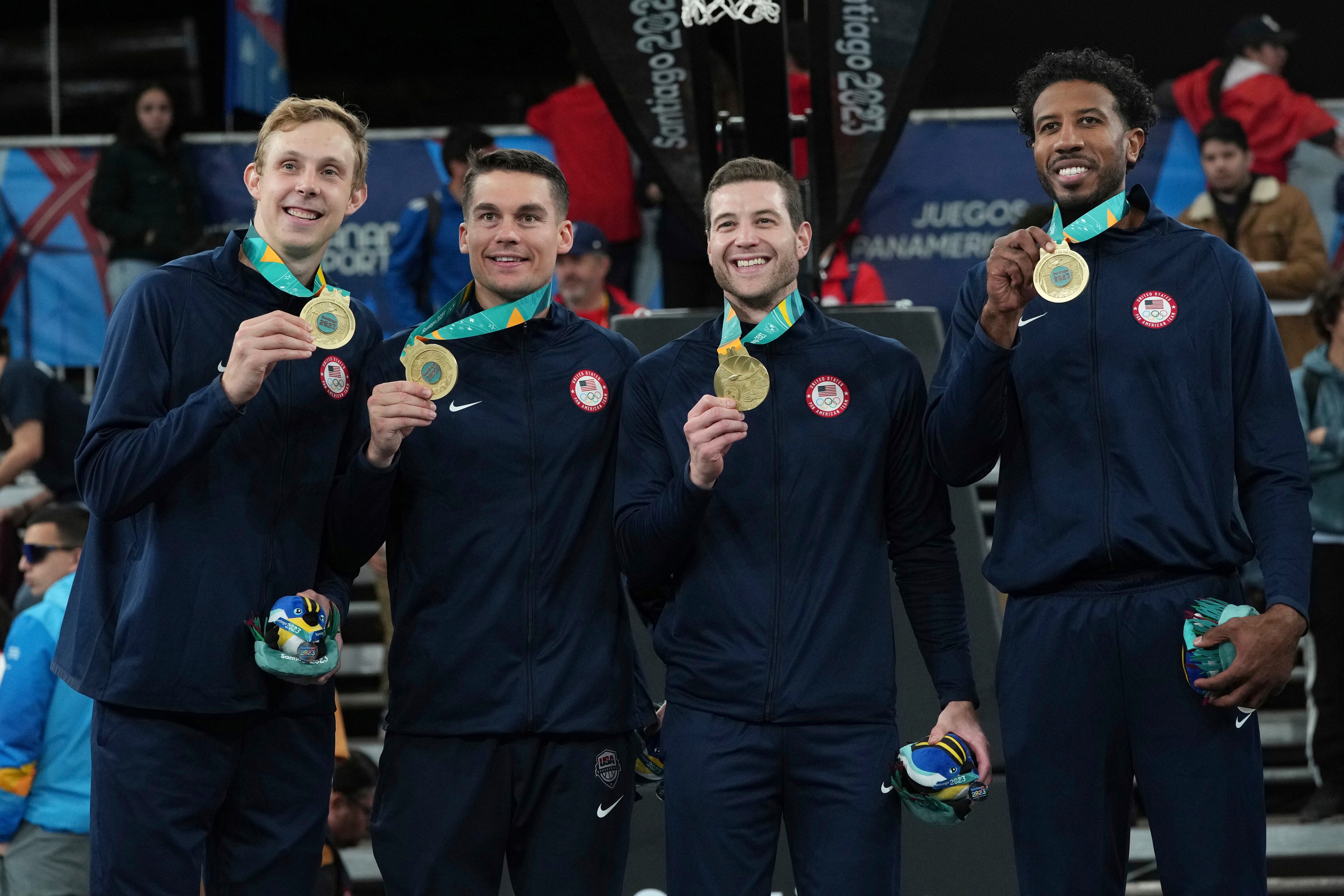 (Dolores Ochoa | AP) Jimmer Fredette, second from right, and the United States team celebrates with their gold medals on the podium of the men's 3x3 basketball at the Pan American Games in Santiago, Chile, Monday, Oct. 23, 2023.