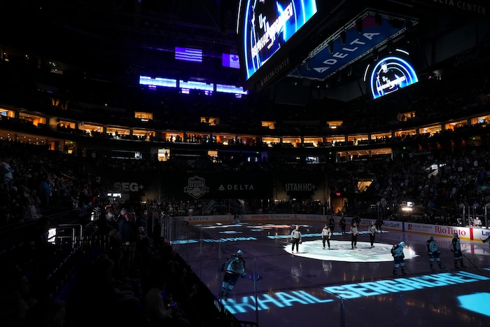 (Bethany Baker  |  The Salt Lake Tribune) Players stand on the ice before the game between the Utah Hockey Club and the Colorado Avalanche at the Delta Center in Salt Lake City on Thursday, Oct. 24, 2024.