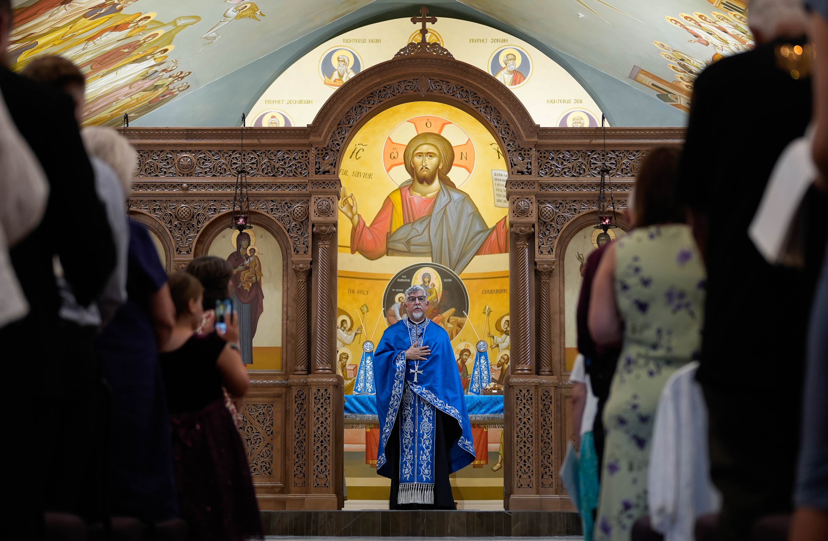(Francisco Kjolseth | The Salt Lake Tribune) Father Anthony Savas of St. Anna Greek Orthodox Church in Sandy addresses parishioners during opening services on Saturday, July 13, 2024, at the new church that was transformed from a garden center into a sacred sanctuary by iconographers from Athens.
