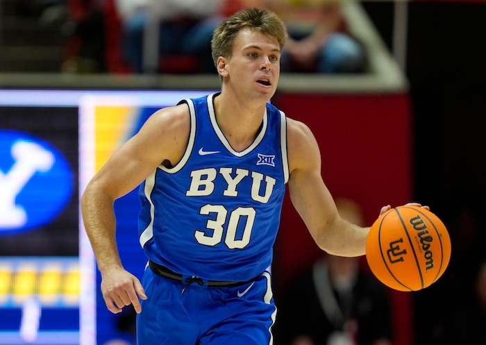 (Bethany Baker  |  The Salt Lake Tribune) Brigham Young Cougars guard Dallin Hall (30) brings the ball down the court against the Utah Utes at the Jon M. Huntsman Center in Salt Lake City on Saturday, Dec. 9, 2023.