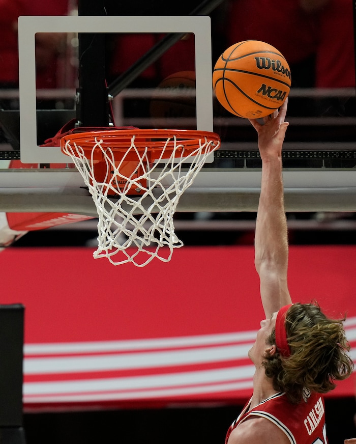 (Bethany Baker  |  The Salt Lake Tribune) Utah Utes center Branden Carlson (35) goes for a lay up against the Brigham Young Cougars at the Jon M. Huntsman Center in Salt Lake City on Saturday, Dec. 9, 2023.