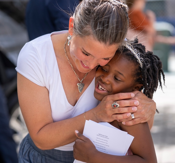 (Rick Egan | The Salt Lake Tribune)  Mayor Erin Mendenhall hugs Audre McDonald at the Juneteenth flag-raising ceremony at City Hall on Monday, June 19, 2023.