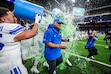 ( Jaren Wilkey | BYU) After beating the Colorado Buffaloes in the 2024 Alamo Bowl, BYU football players celebrate by dumping a cooler on head coach Kalani Sitake.