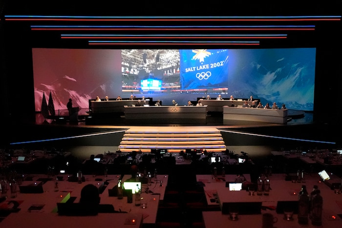 (David Goldman | AP) IOC members watch a video to promote Salt Lake City's bid to host the 2034 Winter Olympics, during the 142nd IOC session at the 2024 Summer Olympics, Wednesday, July 24, 2024, in Paris.