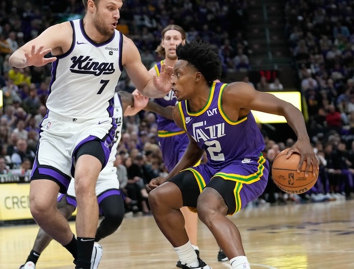 (Francisco Kjolseth  |  The Salt Lake Tribune) Sacramento Kings forward Sasha Vezenkov (7) pessures Utah Jazz guard Collin Sexton (2) as the Utah Jazz host the Sacramento Kings, during NBA basketball in Salt Lake City on Wednesday, Oct. 25, 2023.