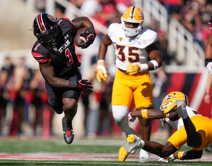 (Francisco Kjolseth  |  The Salt Lake Tribune) Utah Utes running back Jaylon Glover (1) gets tripped up but stays on his feet as the Utah Utes host the Arizona State Sun Devils in NCAA football in Salt Lake City on Saturday, Nov. 4, 2023.