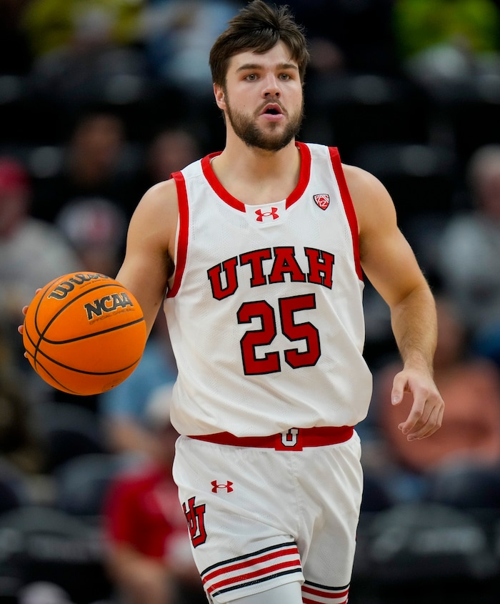 (Bethany Baker  |  The Salt Lake Tribune) Utah Utes guard Rollie Worster (25) brings the ball down the court against the Hawaii Warriors at the Delta Center in Salt Lake City on Thursday, Nov. 30, 2023.
