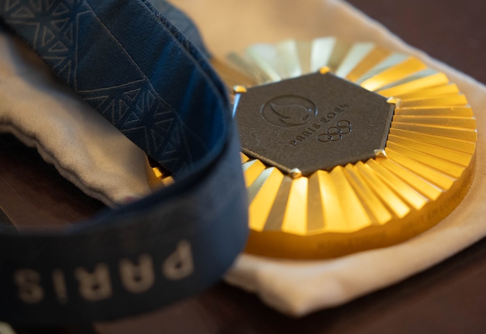 (Francisco Kjolseth  | The Salt Lake Tribune) One of the two gold medals belonging to Hunter Woodhall and Tara Davis-Woodhall, both gold medalists in the Paris 2024 Games, during a visit to Shriners Children’s Hospital in Salt Lake City on Wednesday, Sept. 18, 2024. 