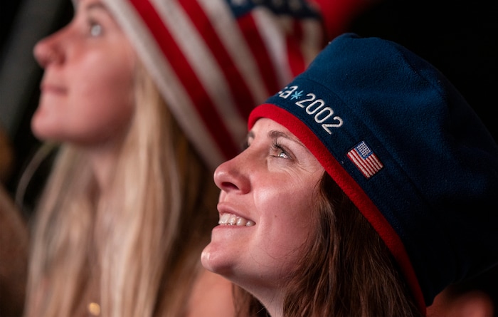 (Rick Egan | The Salt Lake Tribune)  Claire Miller and Jane Parry watch a live stream at Salt Lake City Hall of the vote to host the 2034 Winter Olympics, on Wednesday, July 24, 2024.