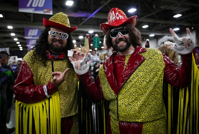 (Bethany Baker | Salt Lake Tribune) Vance Parks, left, and Kuren K, both dressed as American professional wrestler “Macho Man” Randy Savage, pose in Vendor Hall during FanX at Salt Palace Convention Center in Salt Lake City on Friday, Sept. 22, 2023.