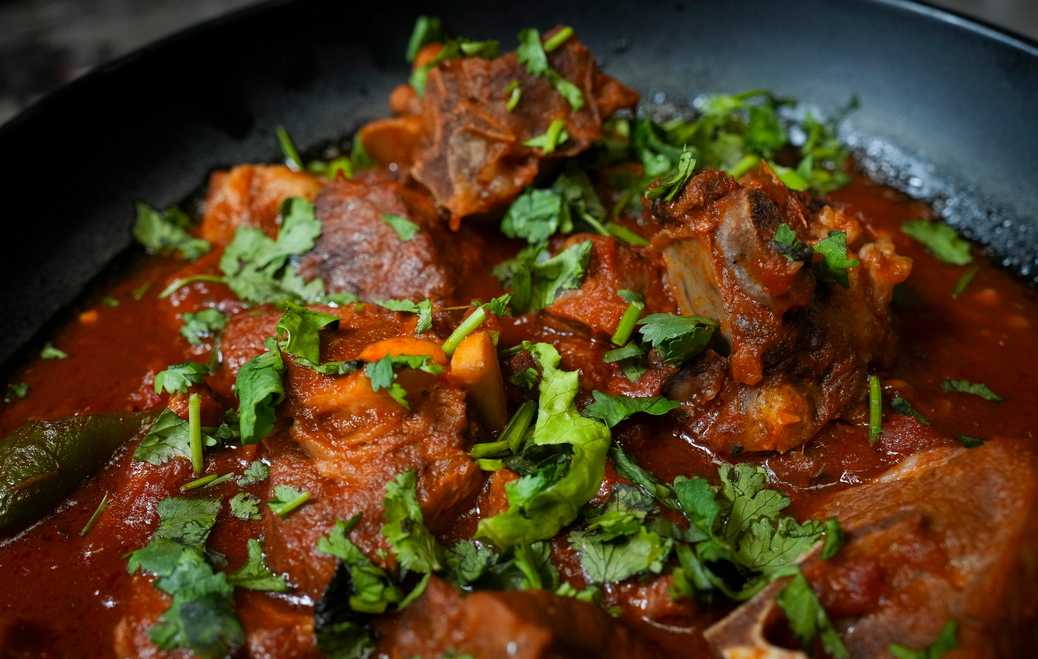 (Bethany Baker | The Salt Lake Tribune) A bowl of lamb shinwari sits on a table at Habibi Grill in Salt Lake City on Aug. 1, 2024.