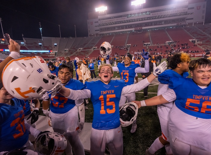 (Rick Egan | The Salt Lake Tribune)   The Timpview Thunderbirds celebrate their 5A State Championship over the Bountiful Redhawks, at Rice-Eccles Stadium, on Friday, Nov. 17, 2023.
