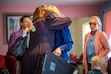 (Trent Nelson  |  The Salt Lake Tribune) Followers of Samuel Bateman embrace at Christine Marie's home after he was arrested during an FBI raid.