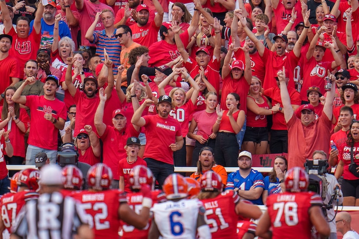 (Trent Nelson  |  The Salt Lake Tribune) Utah fans celebrate a second quarter touchdown as the Utah Utes host the Florida Gators, NCAA football in Salt Lake City on Thursday, Aug. 31, 2023.