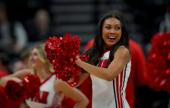 (Bethany Baker  |  The Salt Lake Tribune) University of Utah cheerleaders perform during the game against the Hawaii Warriors at the Delta Center in Salt Lake City on Thursday, Nov. 30, 2023.
