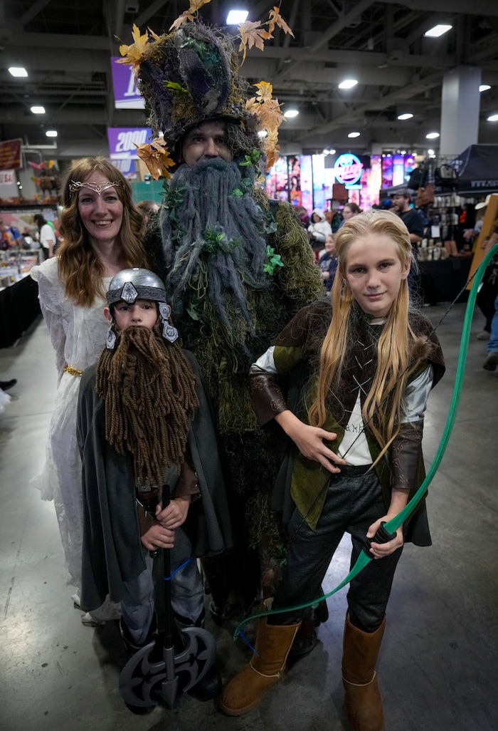 (Bethany Baker | Salt Lake Tribune) The Steele family, dressed as characters from The Lord of the Rings, pose in Vendor Hall during FanX at Salt Palace Convention Center in Salt Lake City on Friday, Sept. 22, 2023.