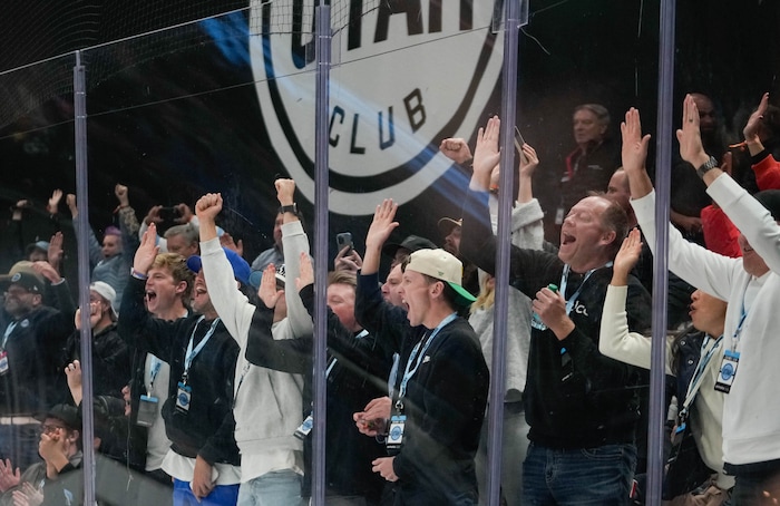 (Francisco Kjolseth  | The Salt Lake Tribune) Utah fans cheer as the Utah Hockey Club scores during an NHL hockey game against the Calgary Flames at the Delta Center in Salt Lake City on Wednesday, Oct. 30, 2024. Utah won 5-1.