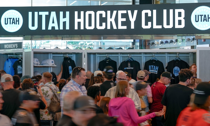 (Francisco Kjolseth  |  The Salt Lake Tribune) People purchase merchandise as the Utah Hockey Club hosts their first NHL draft party at the Delta Center on Friday, June 28, 2024.