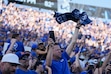 (Bethany Baker  |  The Salt Lake Tribune) A fan cheers during the game between the Brigham Young Cougars and the Arizona Wildcats in Provo on Saturday, Oct. 12, 2024.