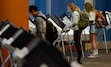 (Francisco Kjolseth  |  The Salt Lake Tribune)  People cast their ballots at the U of U Marriott Library during election day, Tuesday Nov. 5, 2019.