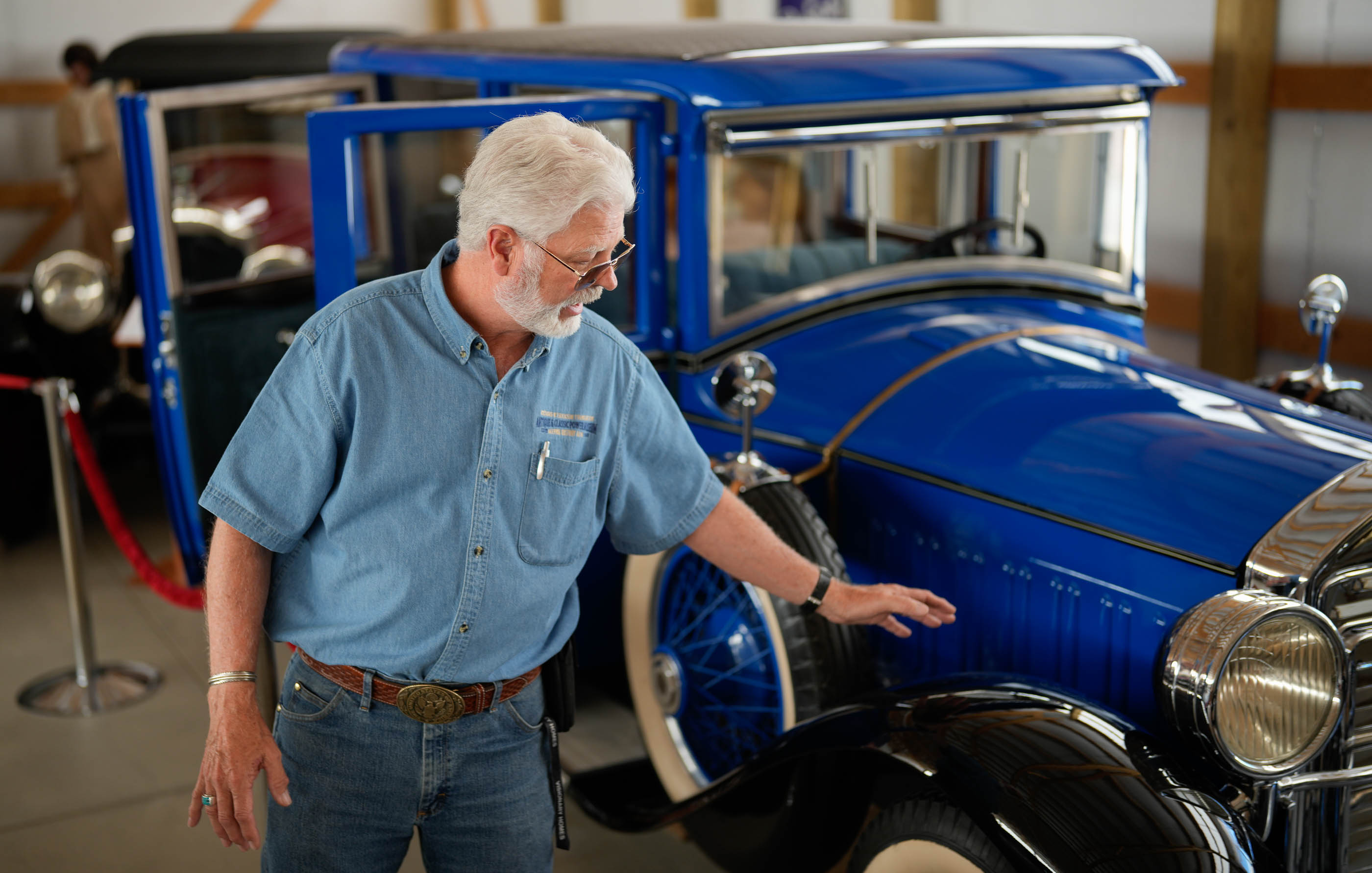 (Francisco Kjolseth  | The Salt Lake Tribune) Russell Baker, curator and chairman of the Richard W. Erickson Foundation Power Show & Museum, points out what would have been an elaborate process in ordering an expensive 1928 Pierce-Arrow to specification on Tuesday, Aug. 6, 2024.