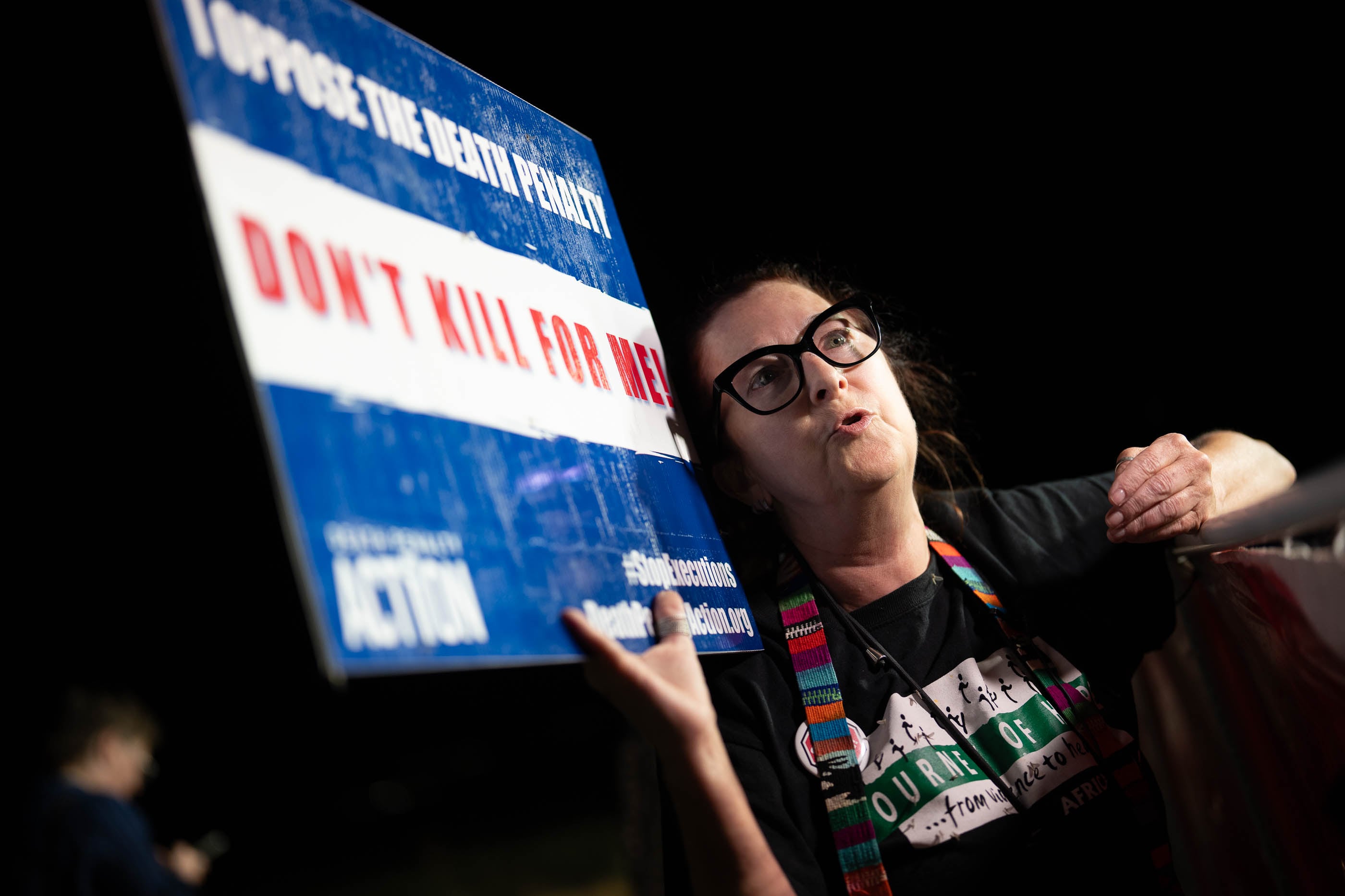 (Francisco Kjolseth | The Salt Lake Tribune) SueZann Bosler speaks in opposition to the death penalty at a free speech zone outside the Utah State Correctional Facility in Salt Lake City, Wednesday, Aug. 7, 2024.