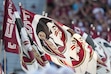 (Peter Joneleit | AP) Florida State Seminoles flags are waved before an NCAA football game on Monday, Sept. 2, 2024 in Tallahassee, Fla.