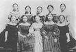 (Church History Library) Ten of Brigham Young’s daughters, photographed in 1865. As social leaders in the Latter-day Saint community, these young women were positioned to lead the new junior retrenchment movement, which eventually grew into the faith's global Young Women program.