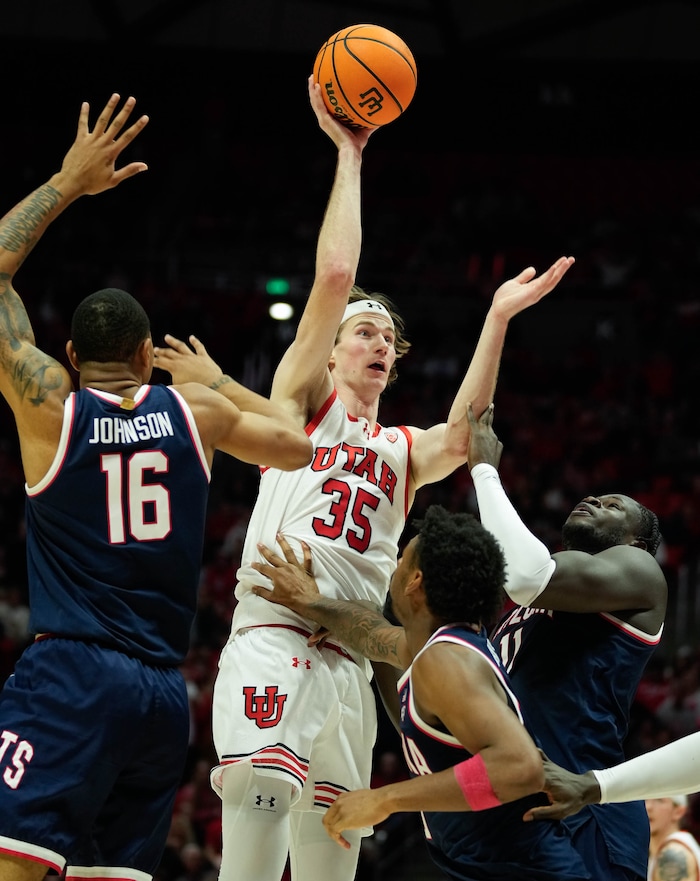 (Francisco Kjolseth  |  The Salt Lake Tribune) Utah Utes center Branden Carlson (35) shoots over the Arizona defense in PAC-12 basketball action between the Utah Utes and the Arizona Wildcats at the Jon M. Huntsman Center, on Thursday, Feb. 8, 2024.