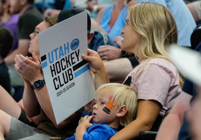 (Francisco Kjolseth  |  The Salt Lake Tribune) Hockey fans join the fun as the Utah Hockey Club hosts their first NHL draft party at the Delta Center on Friday, June 28, 2024.