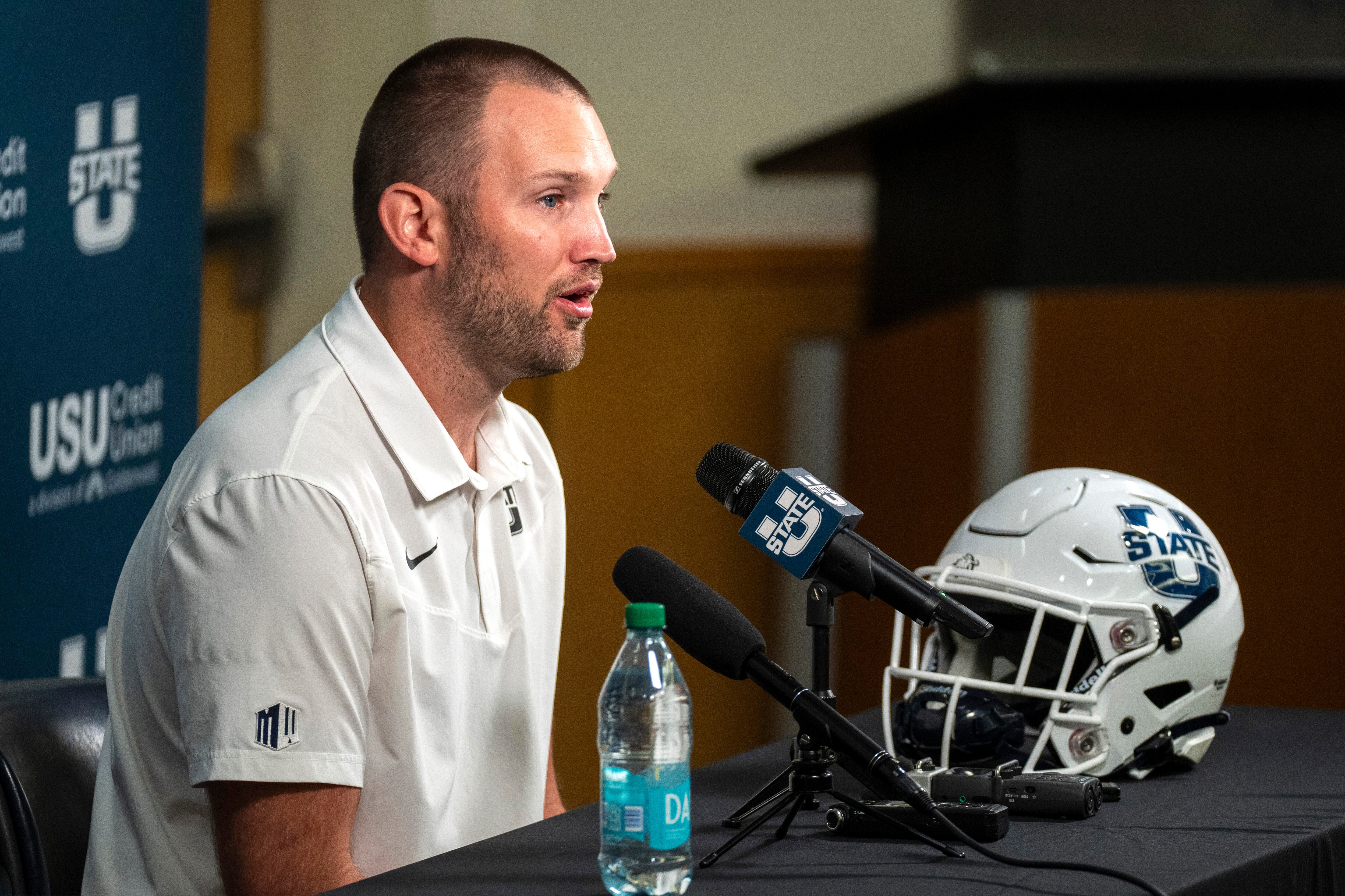 (Rick Egan | The Salt Lake Tribune) Utah State Interim head coach Nate Dreiling is interviewed on media day at the Jim and Carol Laub Athletics-Academics Complex, at Utah State University, on Thursday, Aug. 1, 2024.
