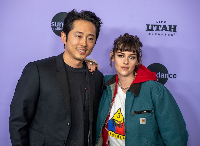 (Rick Egan | The Salt Lake Tribune)   Steven Yeun and Kristen Stewart, on the press line for the premiere of "Love Me" at the Eccles Theatre at the Sundance Film Festival, on Friday, Jan. 19, 2024.
